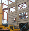 Precast load-bearing steel frame; Concrete floor slab